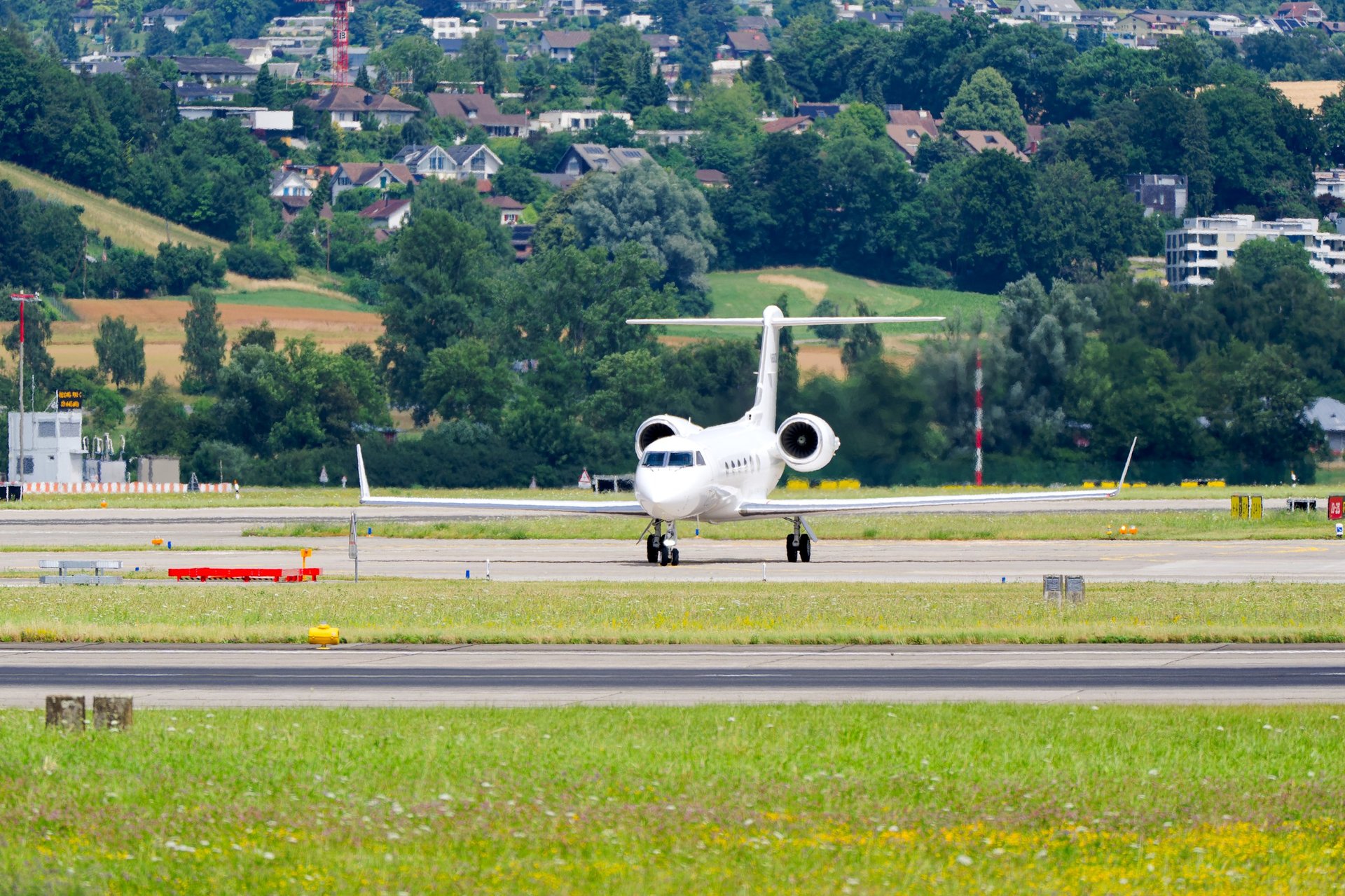 White private jet Gulfstream G-IV taxiing at airport — similar to the GV that Eagle Tech Aviation serviced at FXE Executive Airport