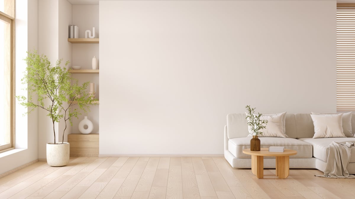 Minimal living room with modern sofa and coffee table wooden furniture with white walls