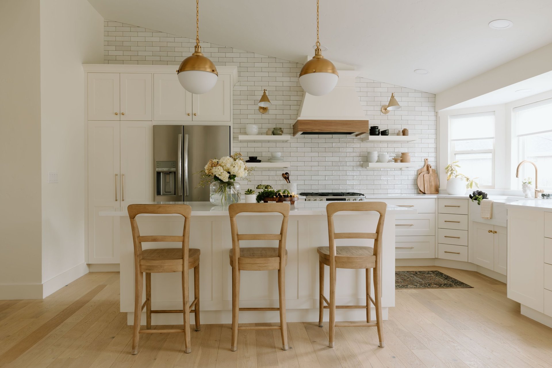 Modern kitchen with island pendant lighting and stainless steel appliances — CN Electrical licensed kitchen electrical planning and renovation wiring in Chilliwack, BC