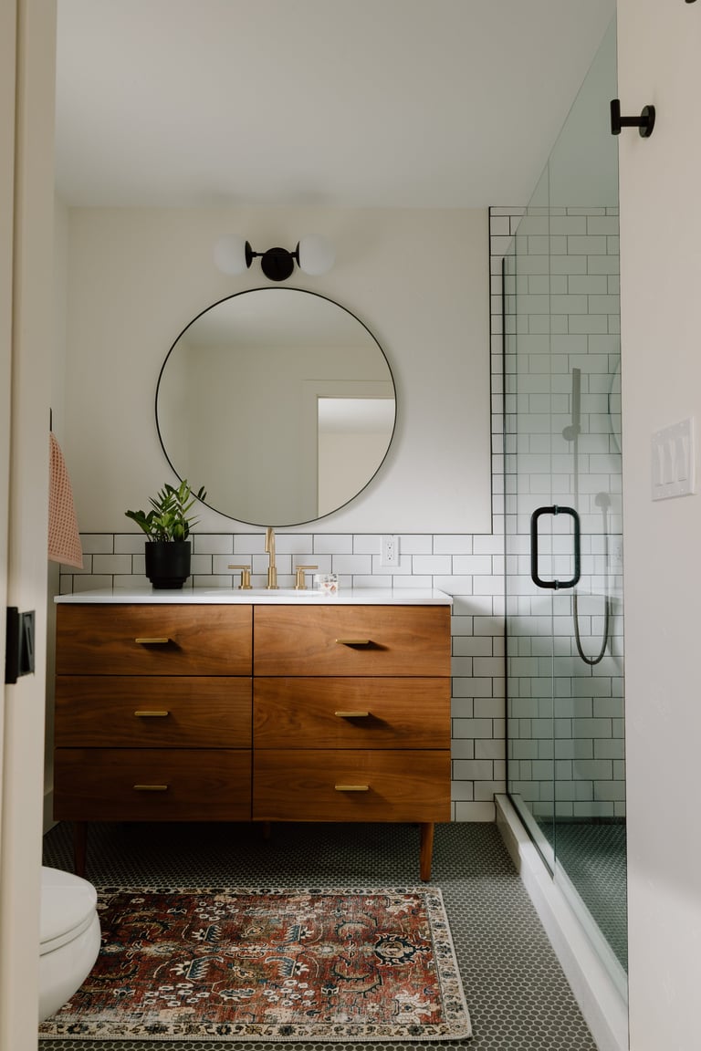 Modern bathroom with wood vanity and glass shower