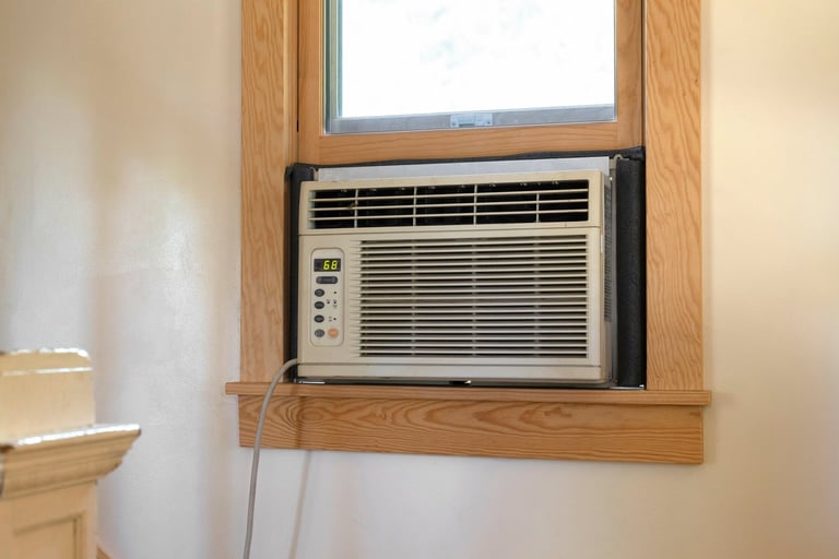 Used window air conditioner for sale at Lopez Tire Shop