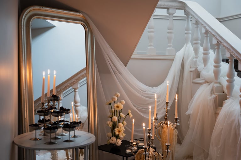 Romantic wedding decor with candles and florals on a staircase