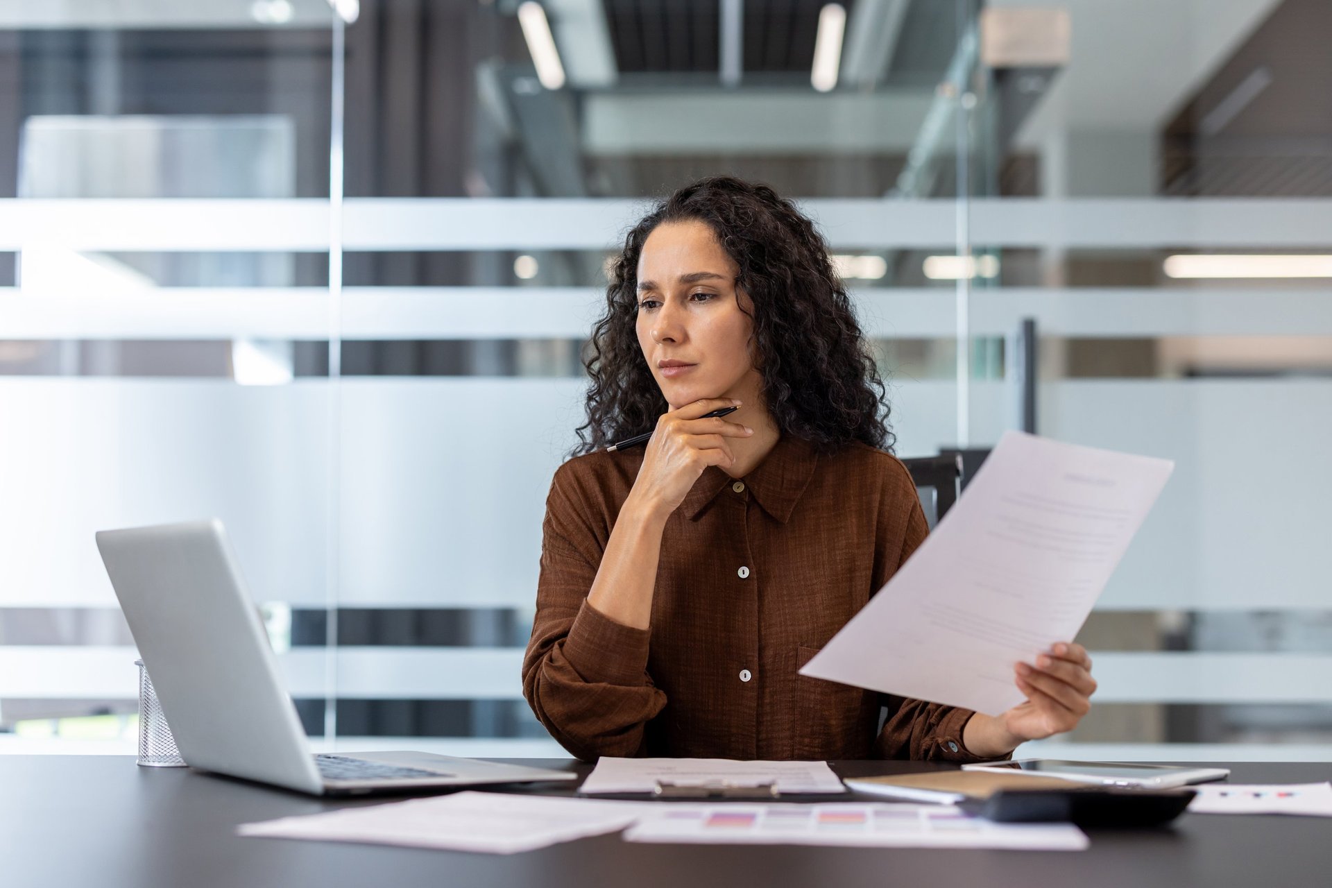 Professional reviewing tax documents