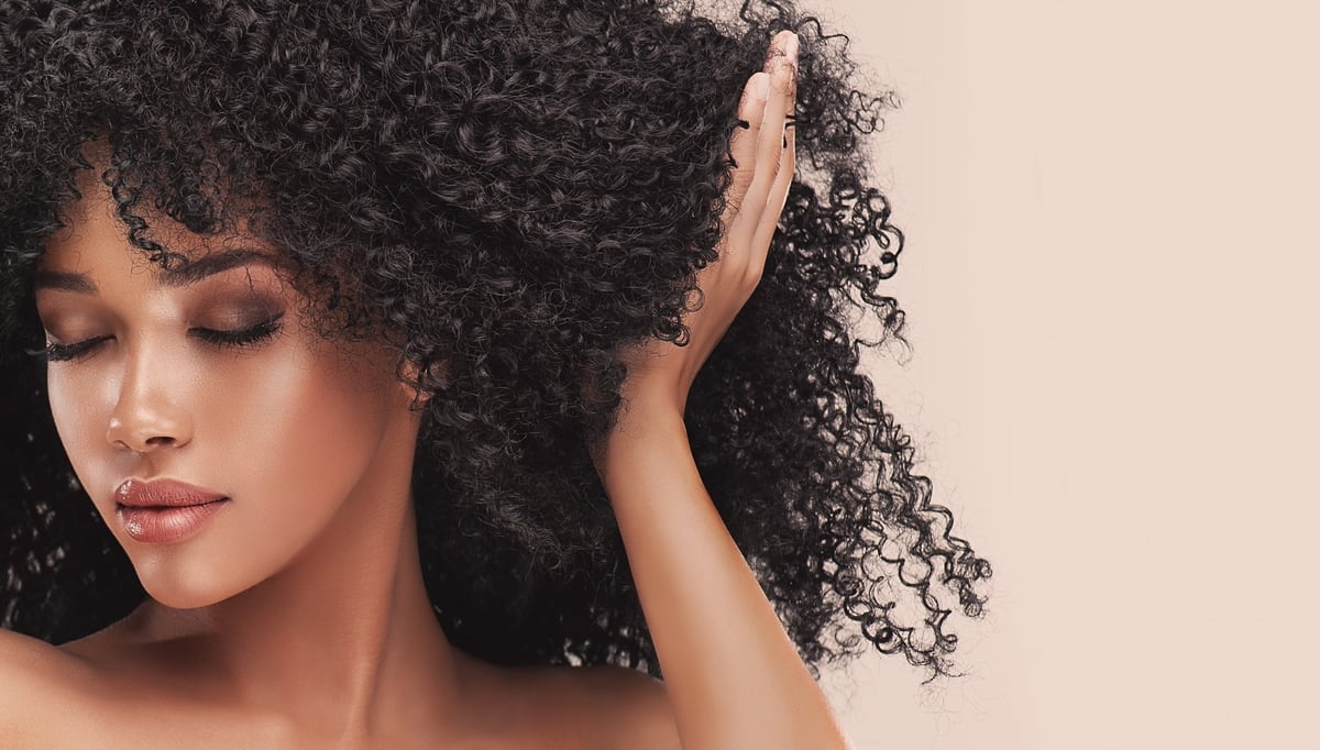Young woman with curly afro hair