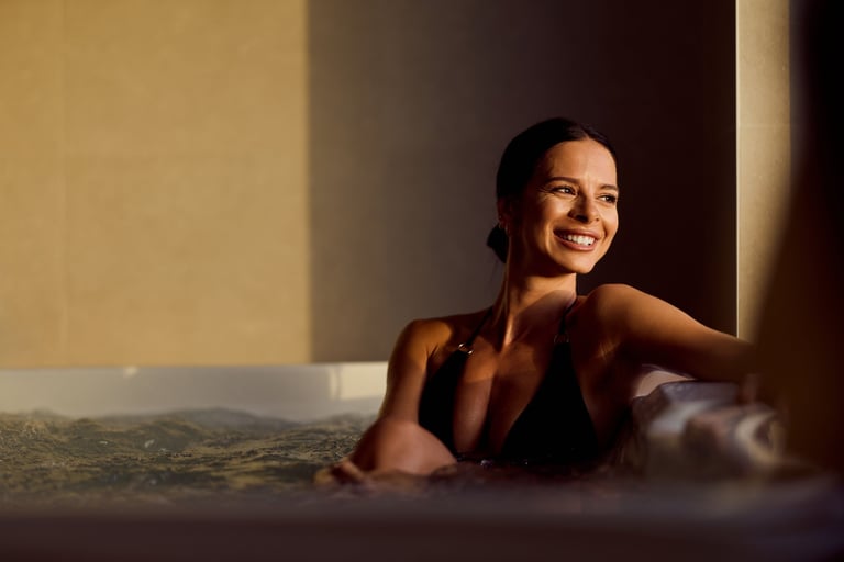 Woman relaxing in warm sunlight at the spa