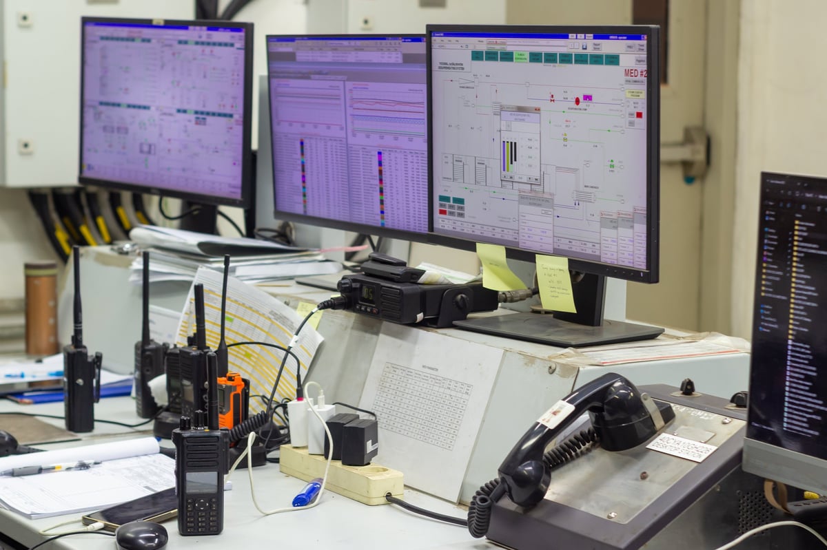 Operations centre with monitoring screens and communications equipment