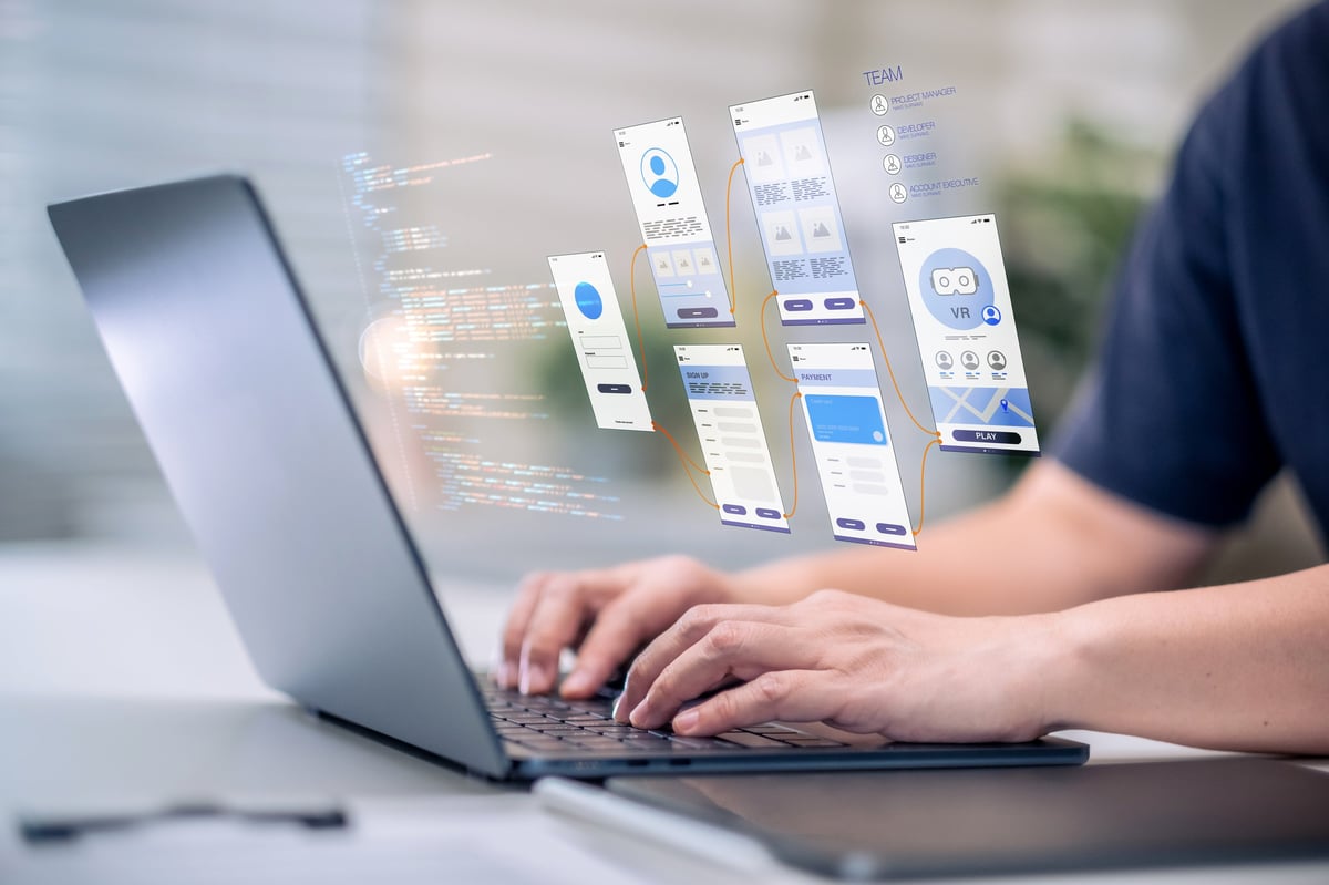 Modern office desk with computer displaying web design concepts — usability, SEO, and security principles
