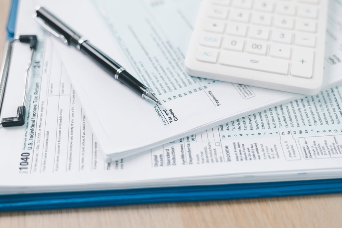 Tax return forms and calculator used to verify self-employed mortgage income
