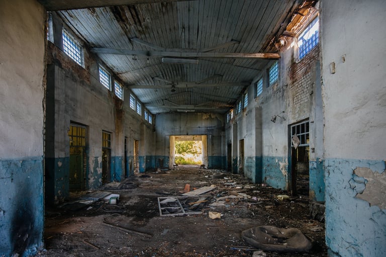 Old broken empty abandoned industrial building interior