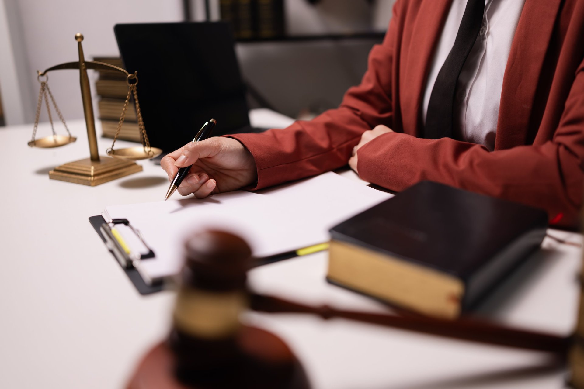 Lawyer businesswoman working diligently with signature document in a modern office, signing contract