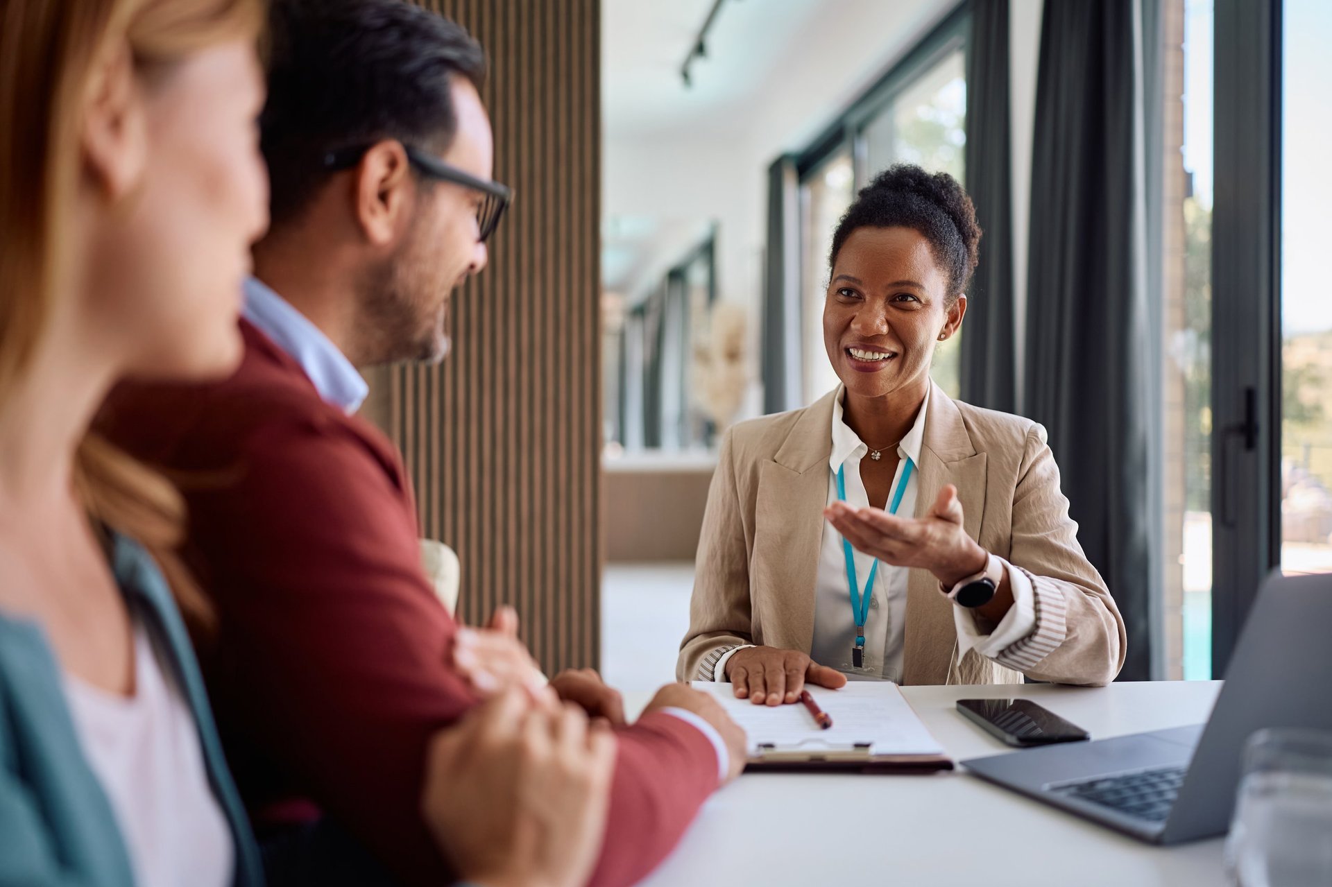 Financial advisor meeting with clients