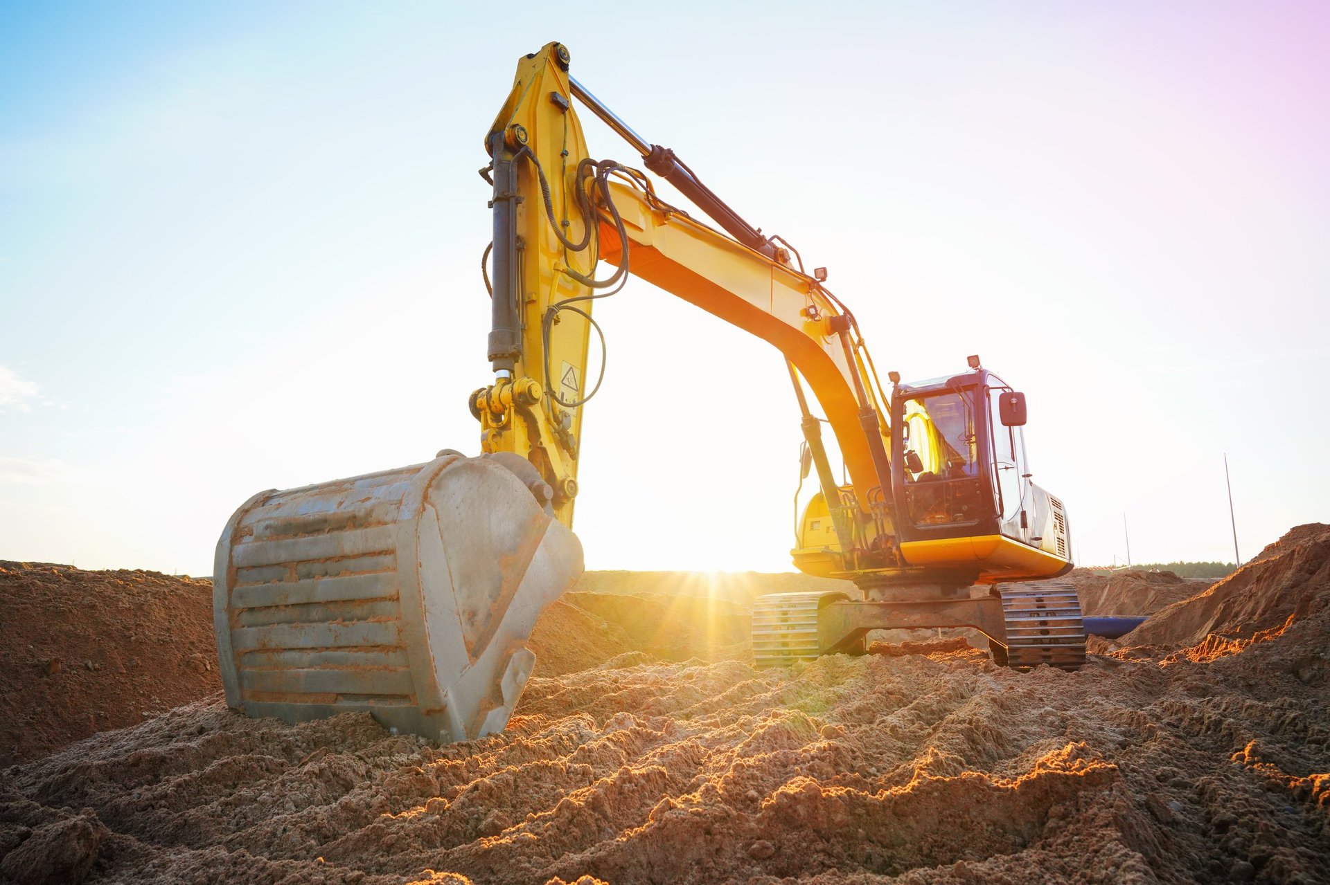 Heavy equipment preparing a construction site