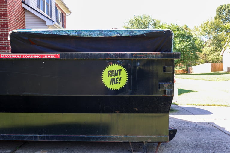 Rented dumpster in residential driveway