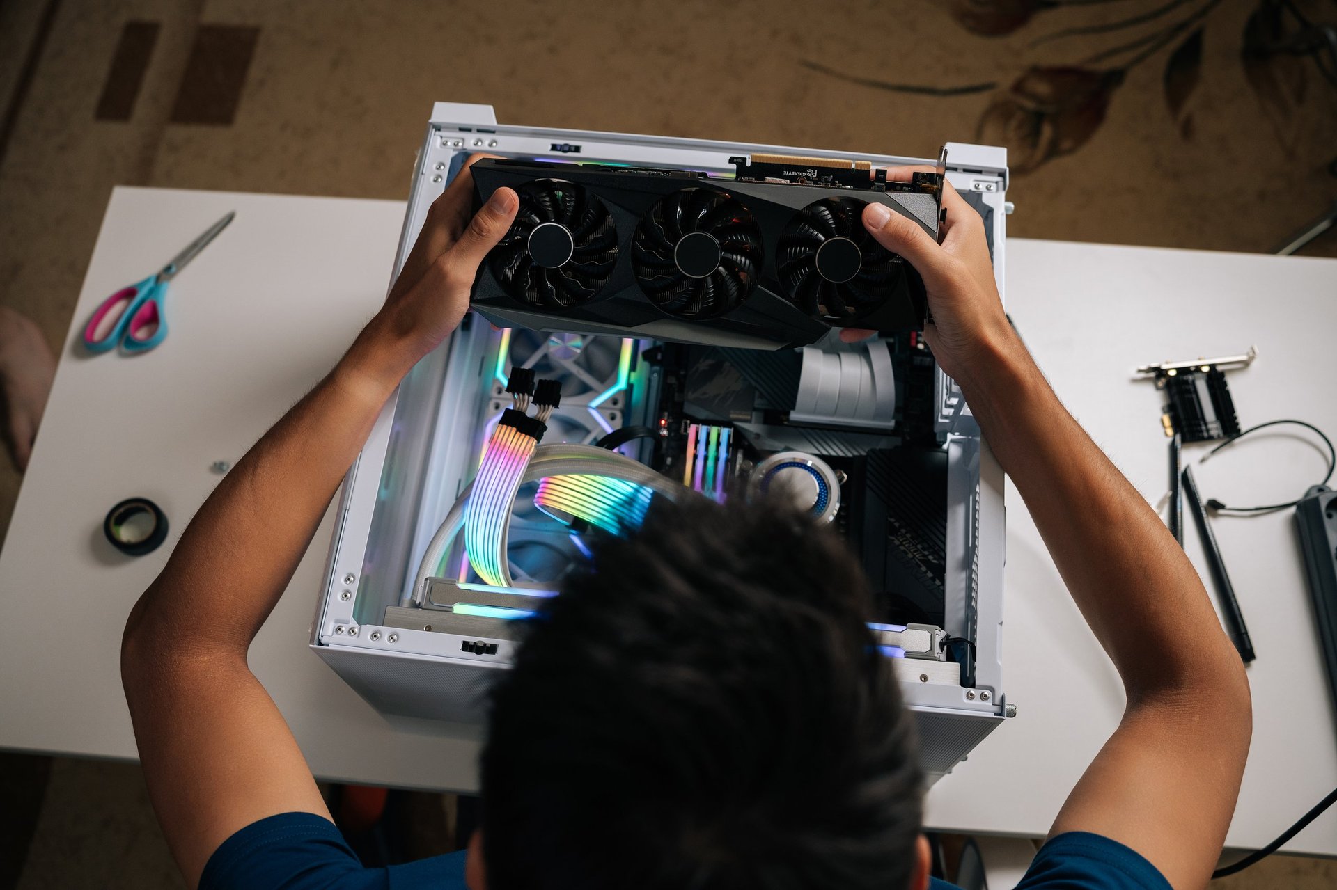 Computer technician installing hardware