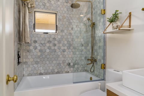 Modern bathroom with gold fixtures