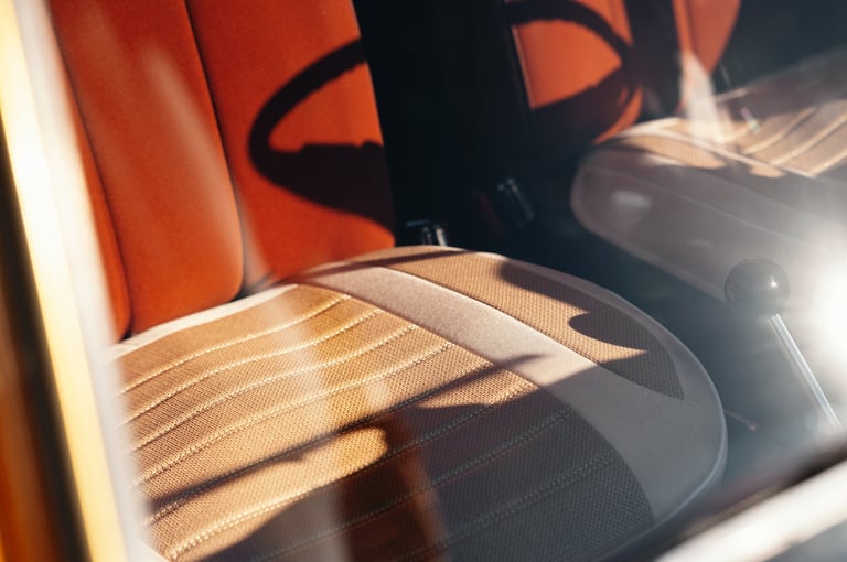 Oldfashioned car cabin with glowing leather seats