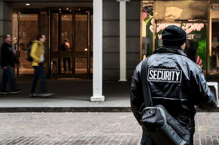 Security officer on duty outside a commercial building