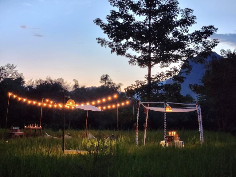 Romantic evening outdoor setup with warm string lights and soft dreamy atmosphere