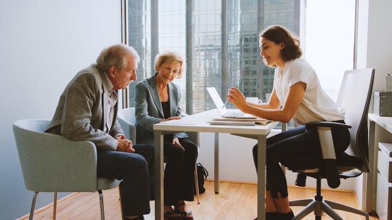 Senior couple meeting with financial advisor