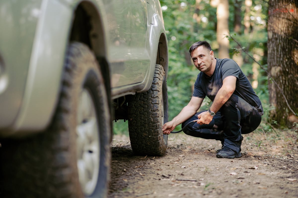 Vehicle maintenance in the rugged outdoors near Hurricane