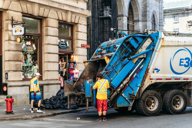 Sanitation workers collecting garbage