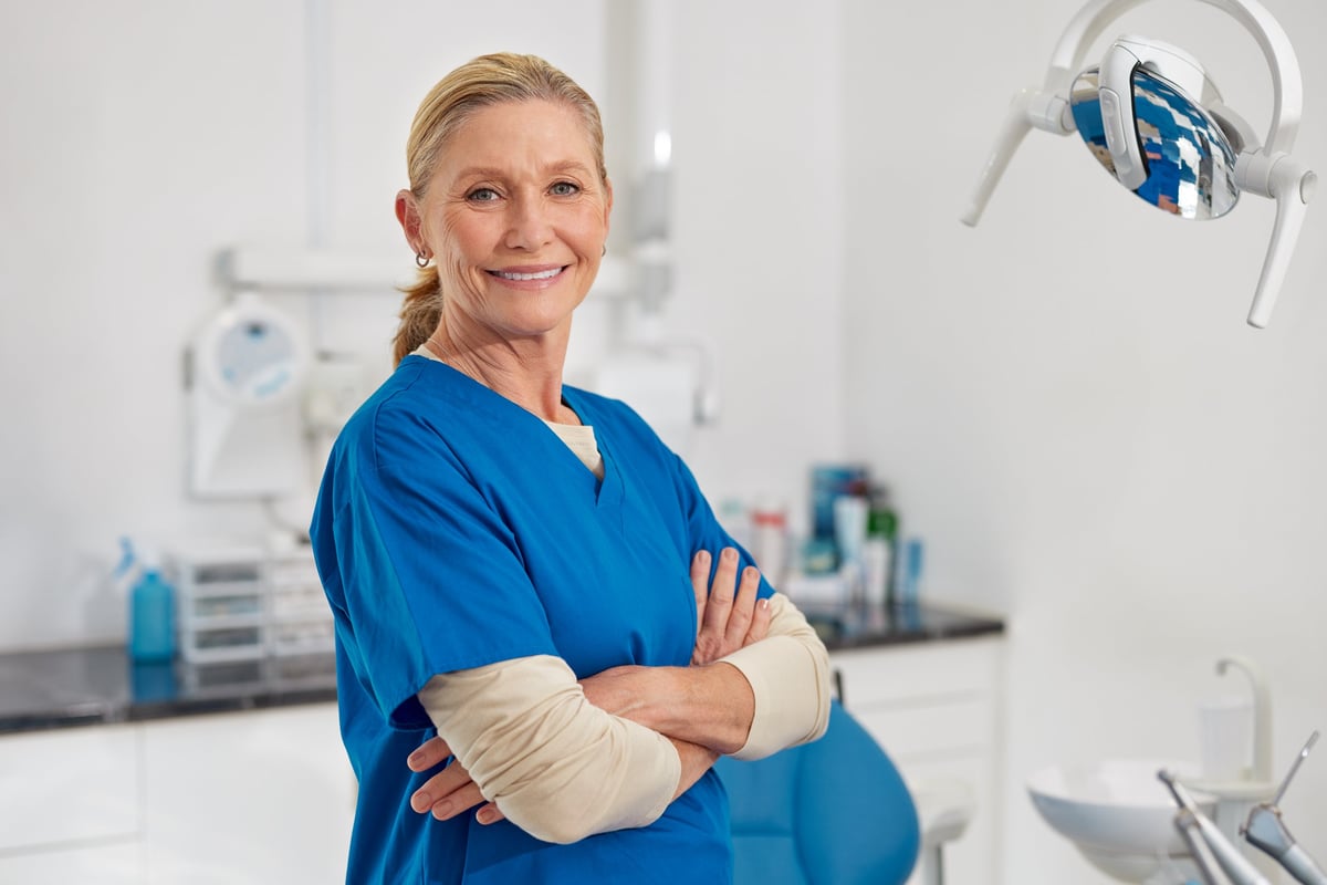 Professional female dentist in modern clinic
