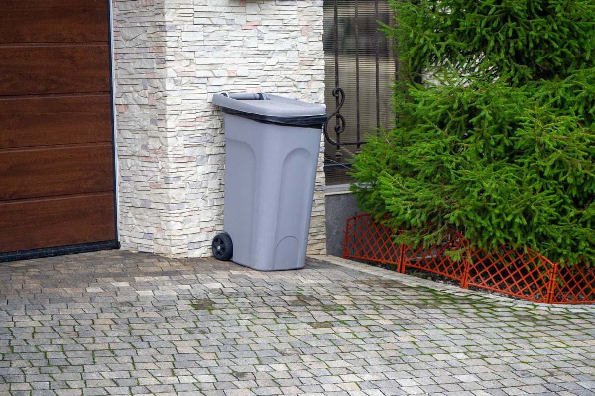 Residential bins on a driveway in The Woodlands
