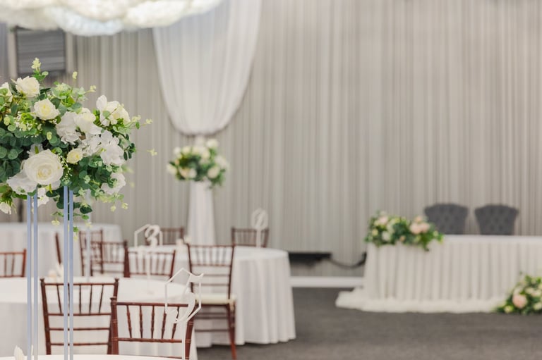 Decorated interior for festive event with elegant table settings