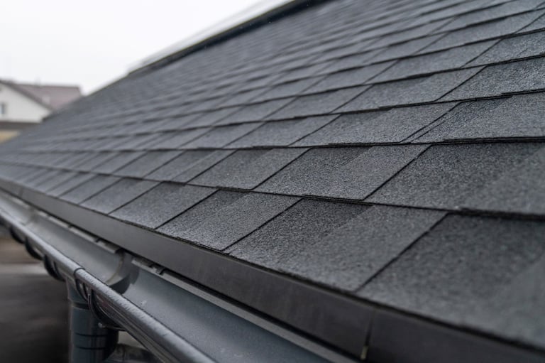 Roof with guttering system