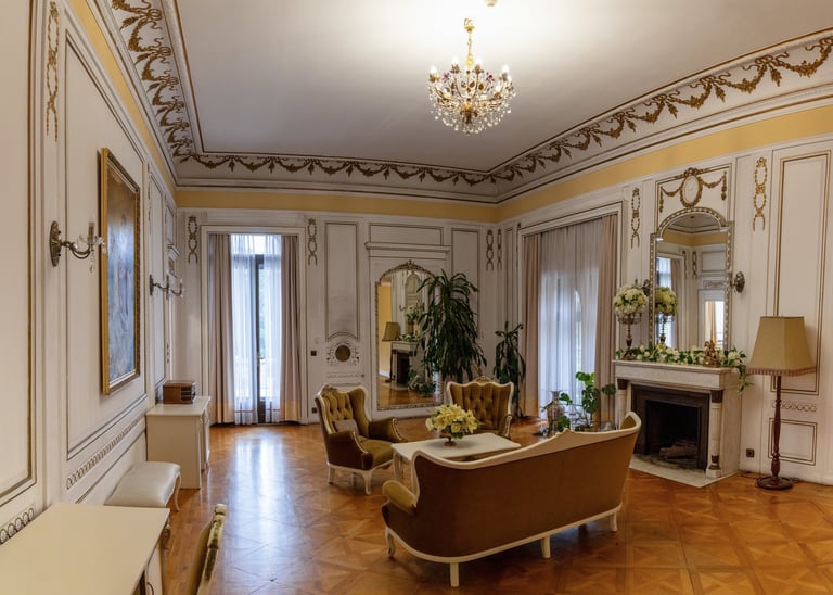 Luxurious sitting room interior of a European castle in warm candlelight