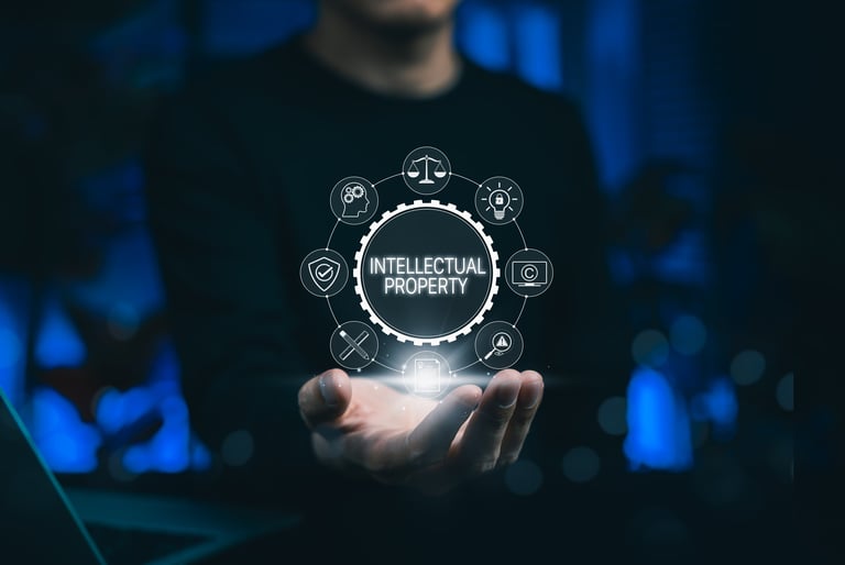 Intellectual property protection concept with businessman showing digital icons for copyright, patent, trademark, and legal rights