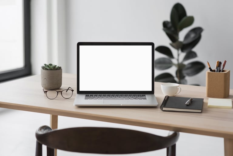 Laptop, notebook, and coffee — a study and work setup
