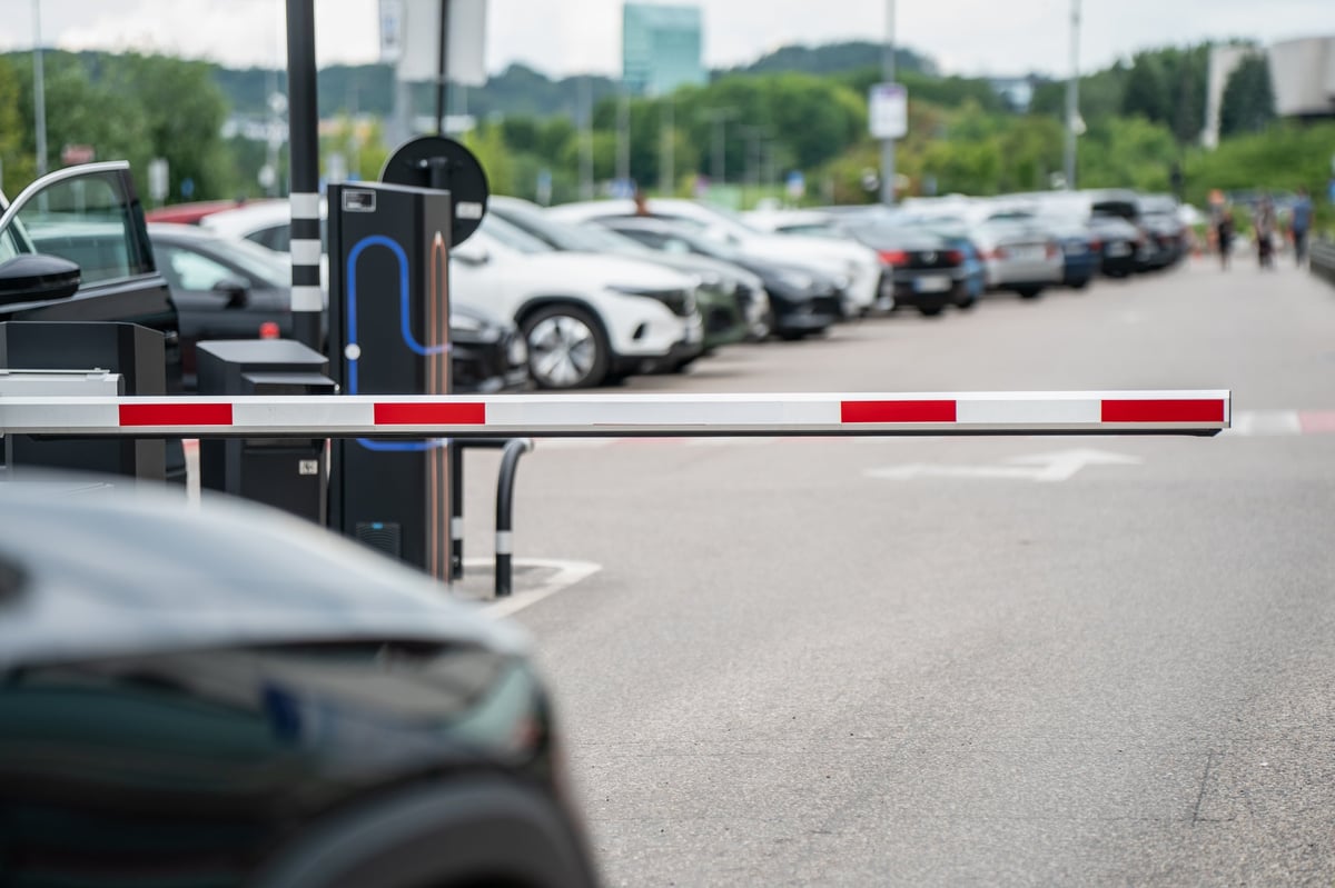 Automated parking barrier gate lifting at the entrance to an organized Seattle parking facility