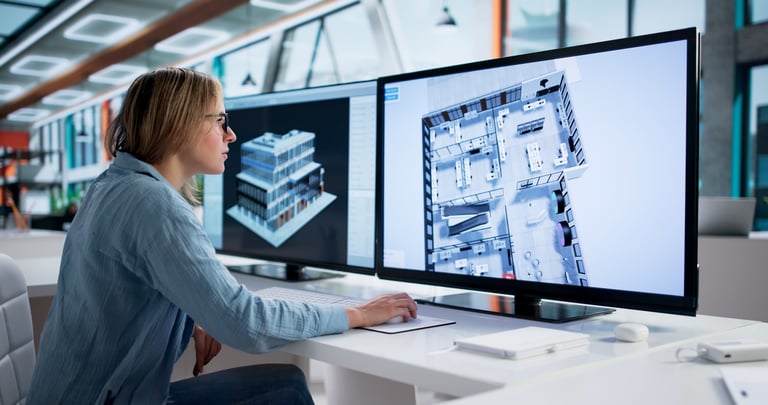 Female architect developing 3D design concept on computer representing professional website and design development