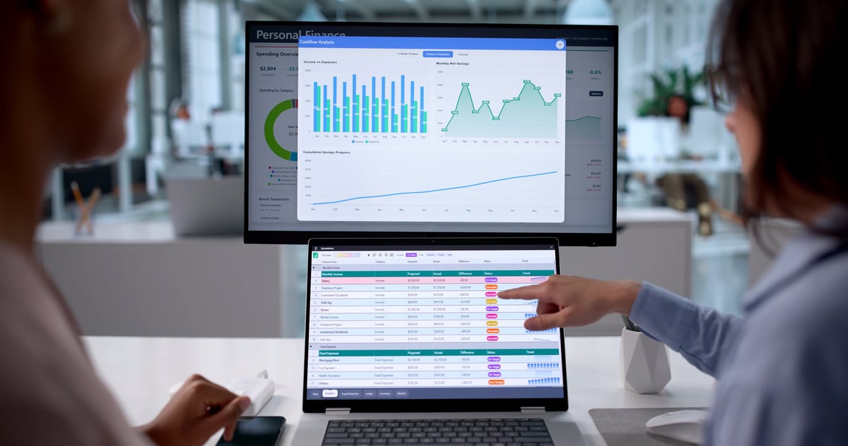 Women Analyze Financial Data Using Spreadsheets And Charts In Hospital.
