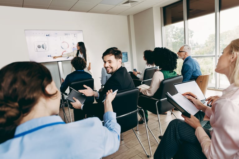 Black African American professionals engaged in corporate training teamwork session