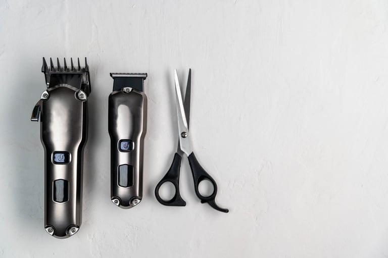 Hair cutting tools on light surface