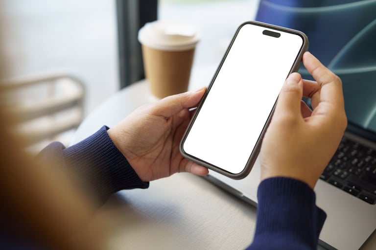 Hands using a smartphone with screen visible representing modern mobile website browsing and digital technology