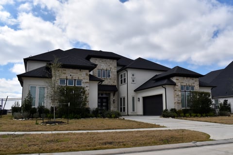 Luxury estate home with elegant exterior after full repaint with Sherwin-Williams Emerald Rain Refresh exterior paint in Frisco TX