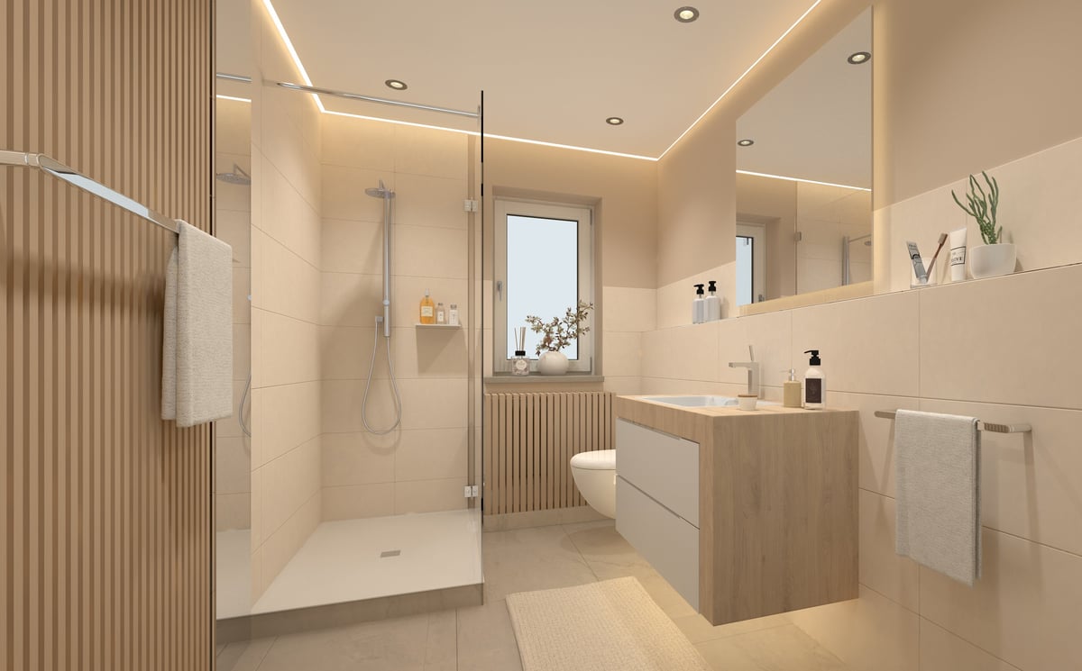 Small bathroom with window toilet sink and glass shower featuring warm tile finishes