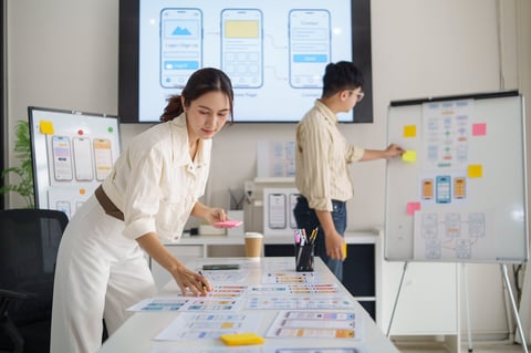 UX designer planning mobile app interface