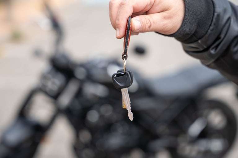 Motorcycle detailing at Arko — bike keys handed over after a full detail service, Pretoria East