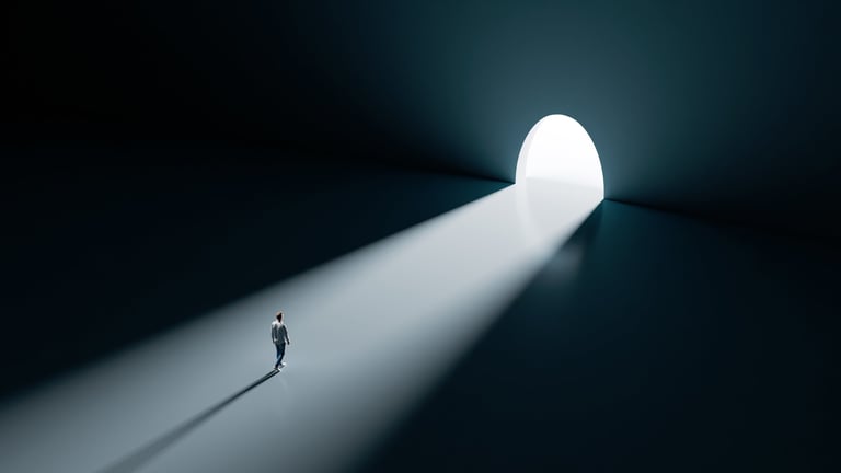 Man walking toward the bright light at the end of a dark tunnel representing hope and recovery