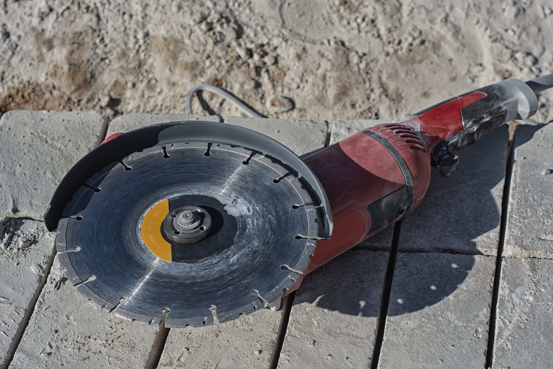 Close up of professional electric power tool for cutting concrete and paving stones