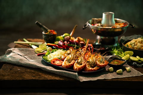 Traditional Thai seafood dinner with grilled prawns