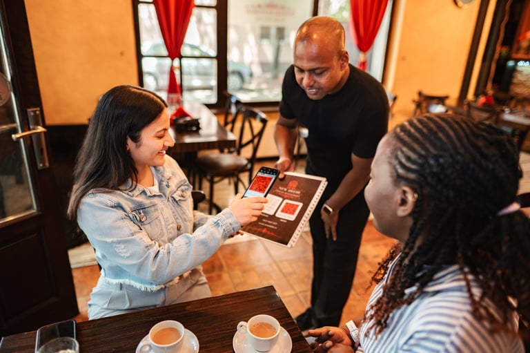 Customer scanning a QR code for a digital menu in a restaurant