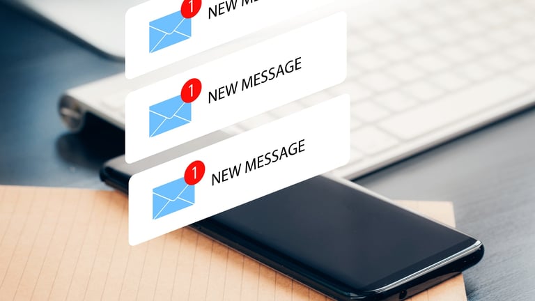 Mobile phone showing notifications of new messages for automated text reply and lead capture system