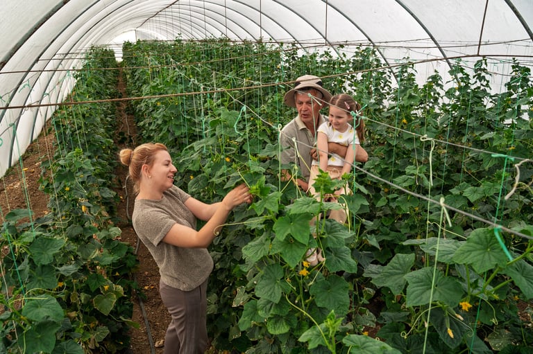 Family small business all generations working inside green house