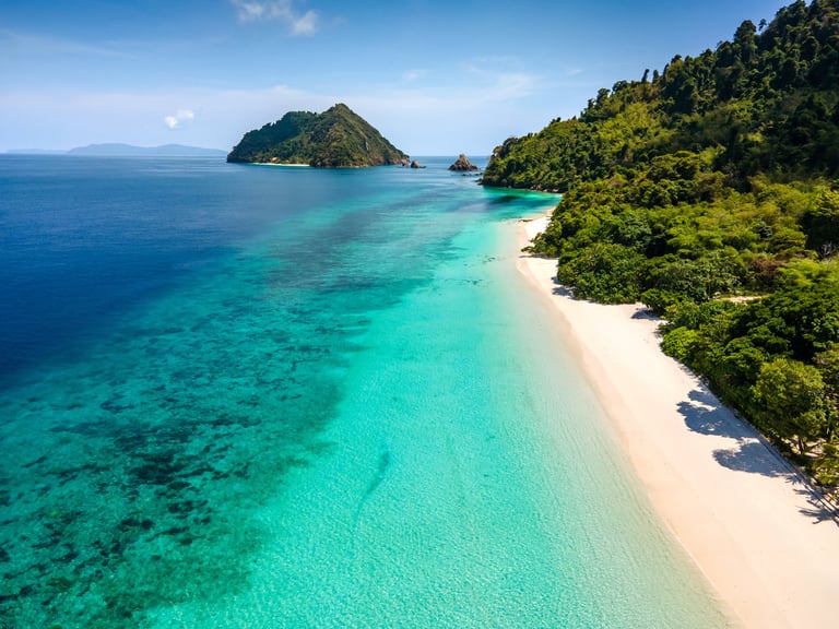 Pristine South Pacific tropical landscape with turquoise water and lush islands