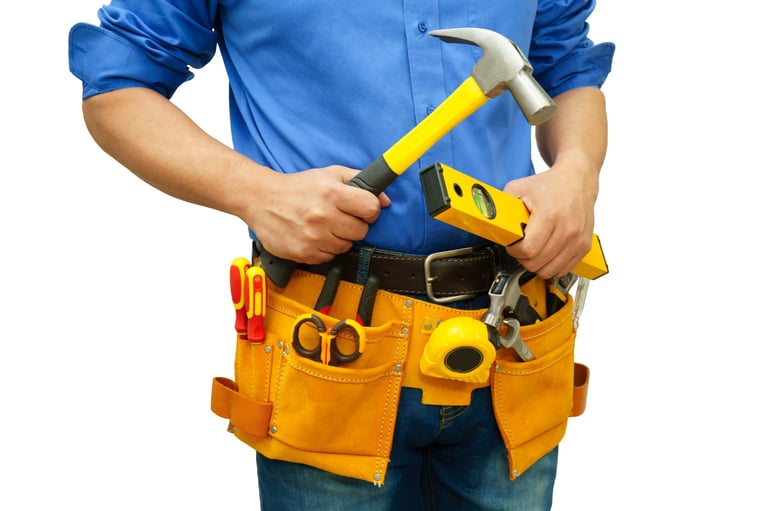 CHM Yorkshire Ltd professional builder with tool belt